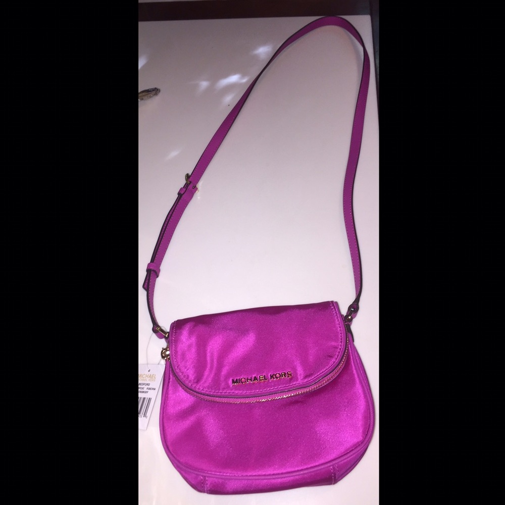 Fuchsia Michael Kors satchel